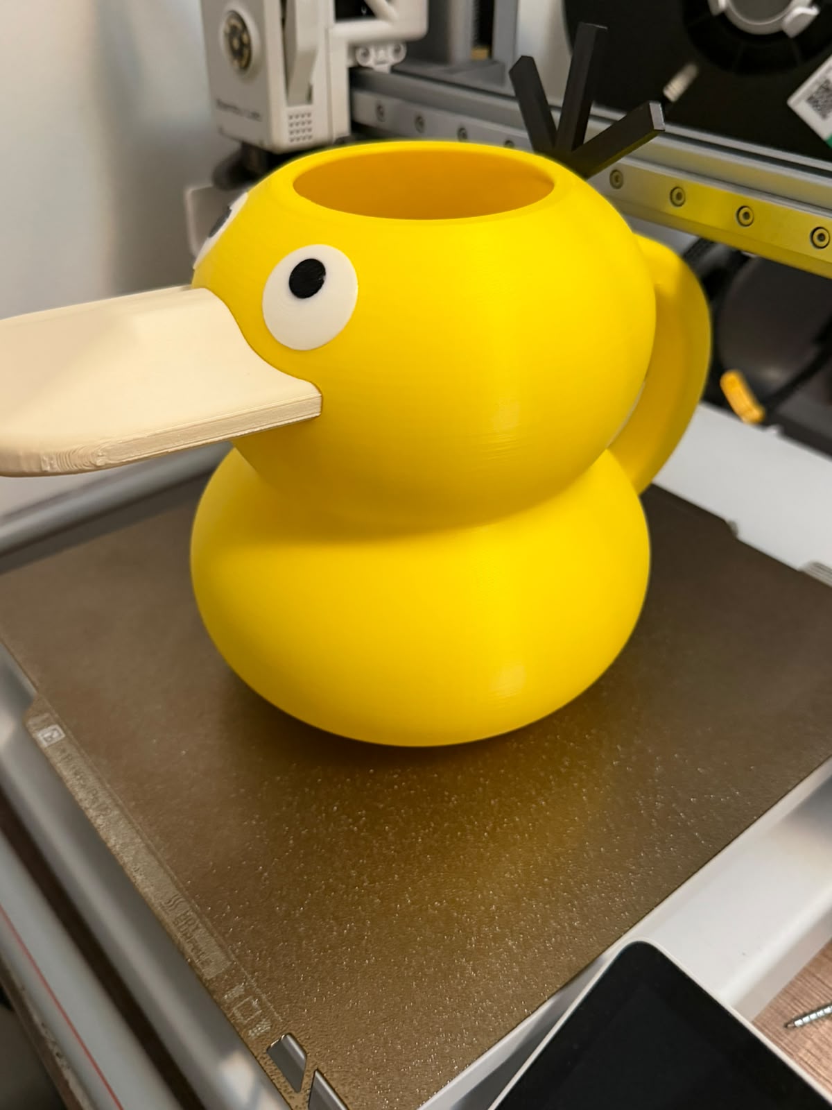 Regadera Psyduck