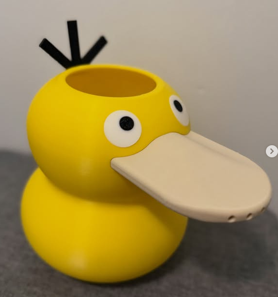 Regadera Psyduck